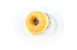 Sugar And Chocolate Donut  On Dish On White Background Stock Photo