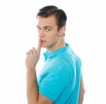 Man Shows Silence Gesture Stock Photo