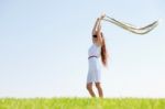 Woman With Flying Veil Stock Photo