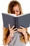 Girl Student Reading Her Notebook Stock Photo