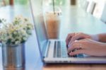 Woman Hands Typing On Laptop Stock Photo