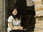 Beautiful Woman At Wat Maheyong Temple. Ayutthaya - Thailand Stock Photo