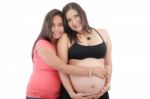 Beautiful Pregnant Woman And Her Daughter Stock Photo