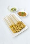 Pork Satay With Peanut Sauce And Cucumber Salsa Stock Photo