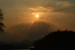 Sunset And Silhouette Mountain Stock Photo