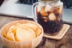 Crispy Potato Chips With Iced Cola Stock Photo