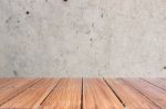 Top Of Wood Table On Old Concrete Wall Background Stock Photo