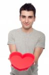 Casual Man Holding Heart Stock Photo