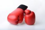 Pair Of Red Leather Boxing Gloves Isolated On White Stock Photo