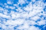 Blue Sky Background With White Clouds Stock Photo