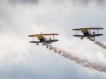 The Trig Aerobatic Team Flying Over Biggin Hill Airport Stock Photo