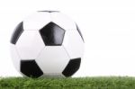 Stitch Leather Soccer Ball On Green Grass Stock Photo