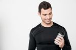 Fitness Man Looking His Sipper Bottle Stock Photo