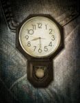 Vintage Clock On Jeans Background Stock Photo