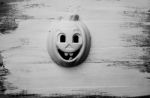 Pumpkin Mask On Wooden Floor Background For Halloween Stock Photo