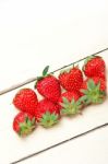 Fresh Organic Strawberry Over White Wood Stock Photo