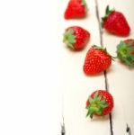 Fresh Organic Strawberry Over White Wood Stock Photo