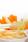 Fresh Hummus Dip With Raw Carrot And Celery Stock Photo