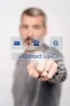 Contact Us Button On Virtual Screen Stock Photo