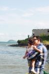 Father And Daughter At The Ocean Stock Photo