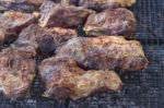 Traditional Meat Grilled On The Grill In The Argentine Countryside Stock Photo