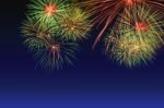 Colorful Fireworks Celebration And The Twilight Sky Background Stock Photo