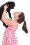 Girl Kissing Dog Stock Photo