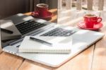 Hot Coffee Cup On Wooden Work Station Stock Photo