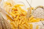 Italian Pasta Penne With Wheat Stock Photo