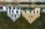 Reflection Of Colourful Buildings Along The Vlatava River In Kru Stock Photo