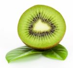 Kiwi Fruit On Leaves Stock Photo