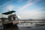 Motor Boat With Low Tide Stock Photo