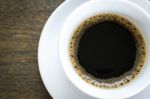 Coffee In White Cup On Wood Table Stock Photo