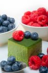 Green Tea Matcha Mousse Cake With Berries Stock Photo