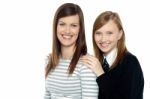 Daughter Resting Hands On Mothers Shoulders Stock Photo