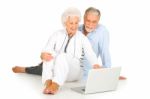 Old Eldery Couple With Laptop Stock Photo