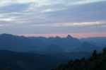 Sweet Sky With Big Mountains Background Stock Photo