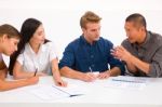 Group Of Diverse Business People In Meeting Stock Photo