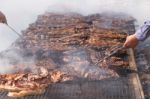 Traditional Meat Grilled On The Grill In The Argentine Countryside Stock Photo