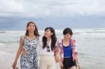 Portrait Of Young Asian Woman Friend Group Relaxing Cacation On Sea Beach With Smiling And Happiness Face Stock Photo