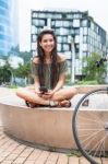 Portrait Of Young Girl Listening To Music Stock Photo