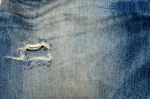 Torn Jeans Stock Photo