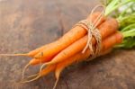 Baby Carrots Bunch Tied With Rope Stock Photo