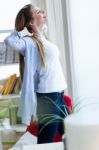 Beautiful Young Businesswoman Taking A Break In The Office Stock Photo