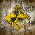 Old Radiation Sign On Wall Stock Photo