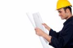 Construction Worker Reviewing Plan Stock Photo