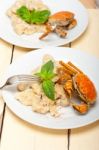 Italian Gnocchi With Seafood Sauce With Crab And Basil Stock Photo