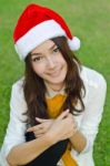 Beautiful Young Santa Clause Woman Stock Photo