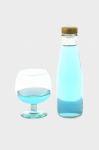 Blue Beverage Drinking Glass And Bottle On Gray Background Stock Photo