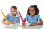 Pretty Kids Appearing For Annual Exam Stock Photo